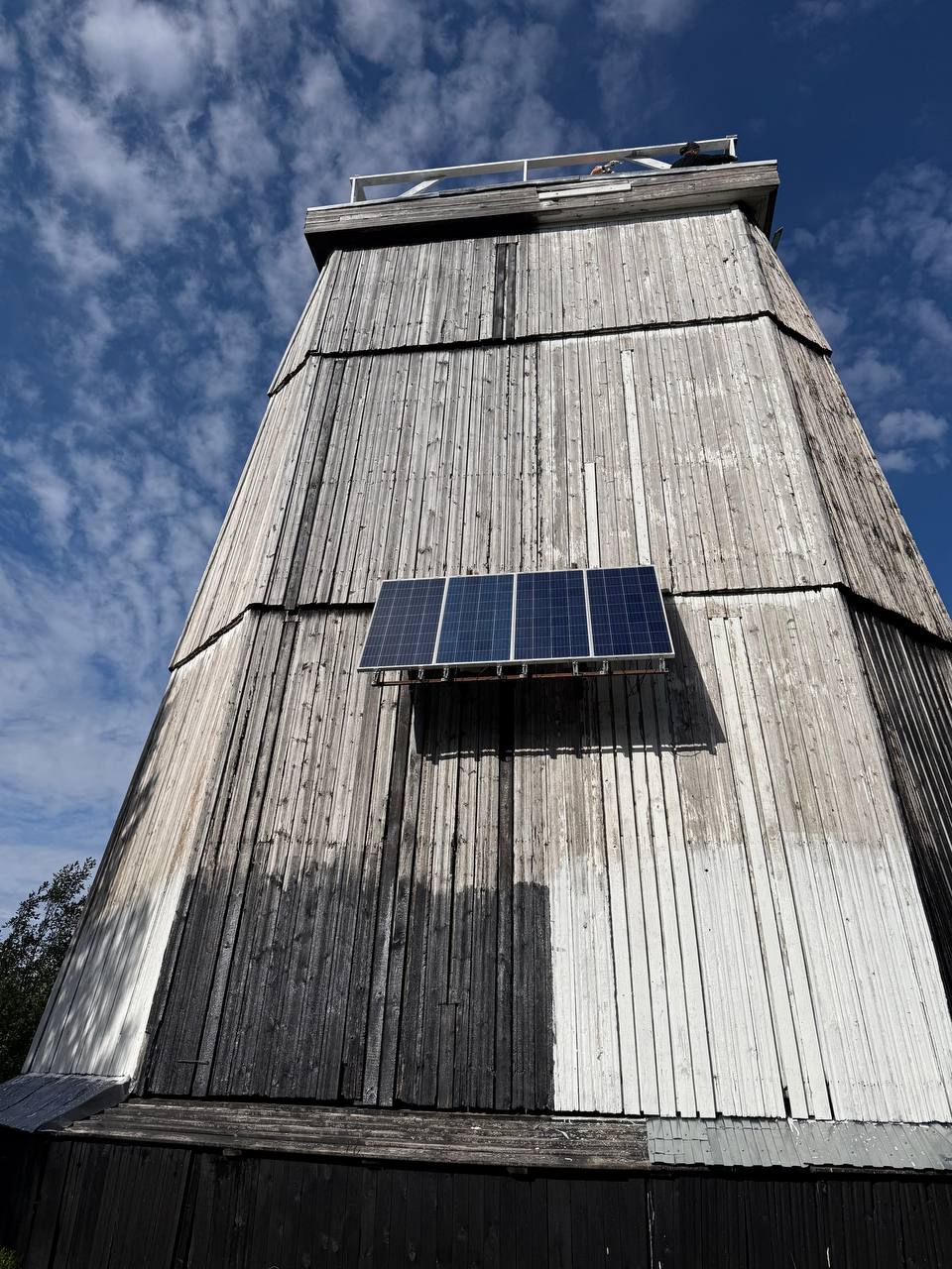 Solar panel mounted on the wooden lighthouse tower